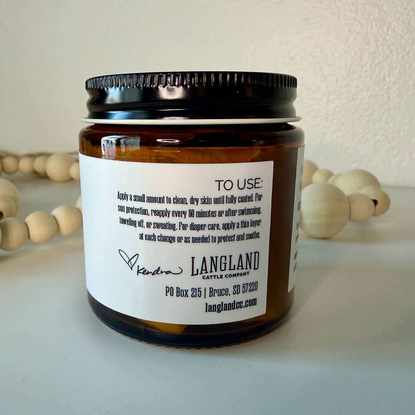 Whipped Tallow Sun + Bun Balm natural vegan sunscreen and soothing balm container